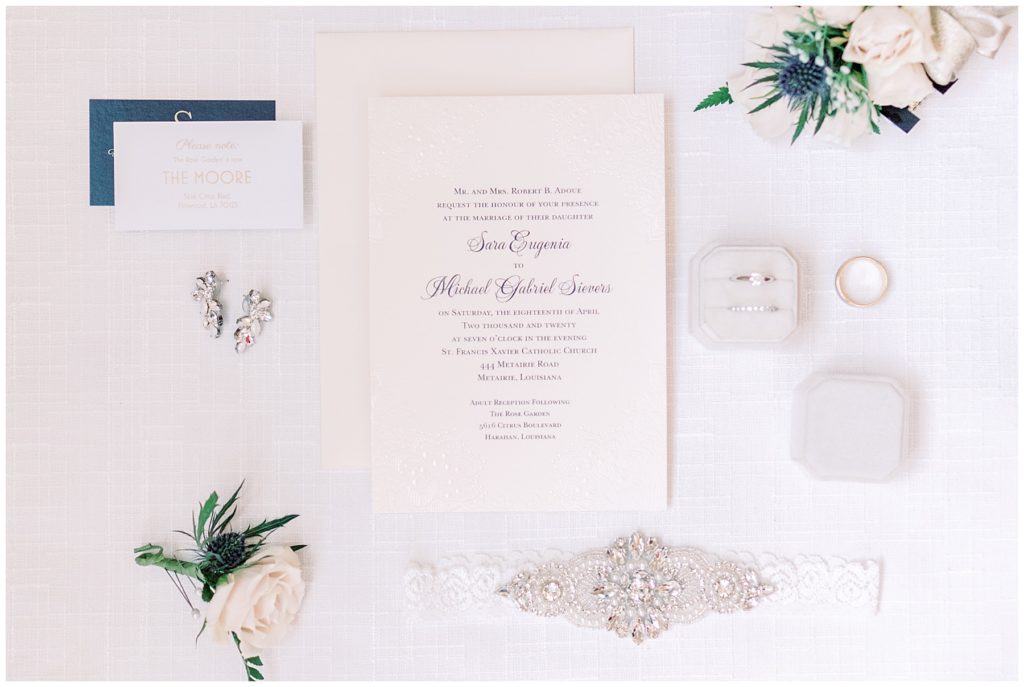 Sara and Michael's wedding day details: invitation, rings, florals and jewelry